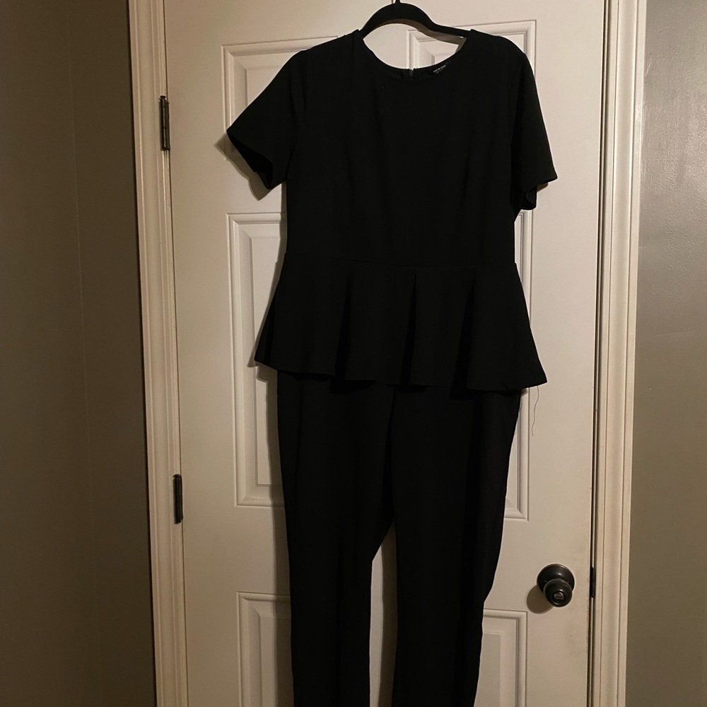 Black peplum shein jumpsuit. A 2x but fits like a 1x